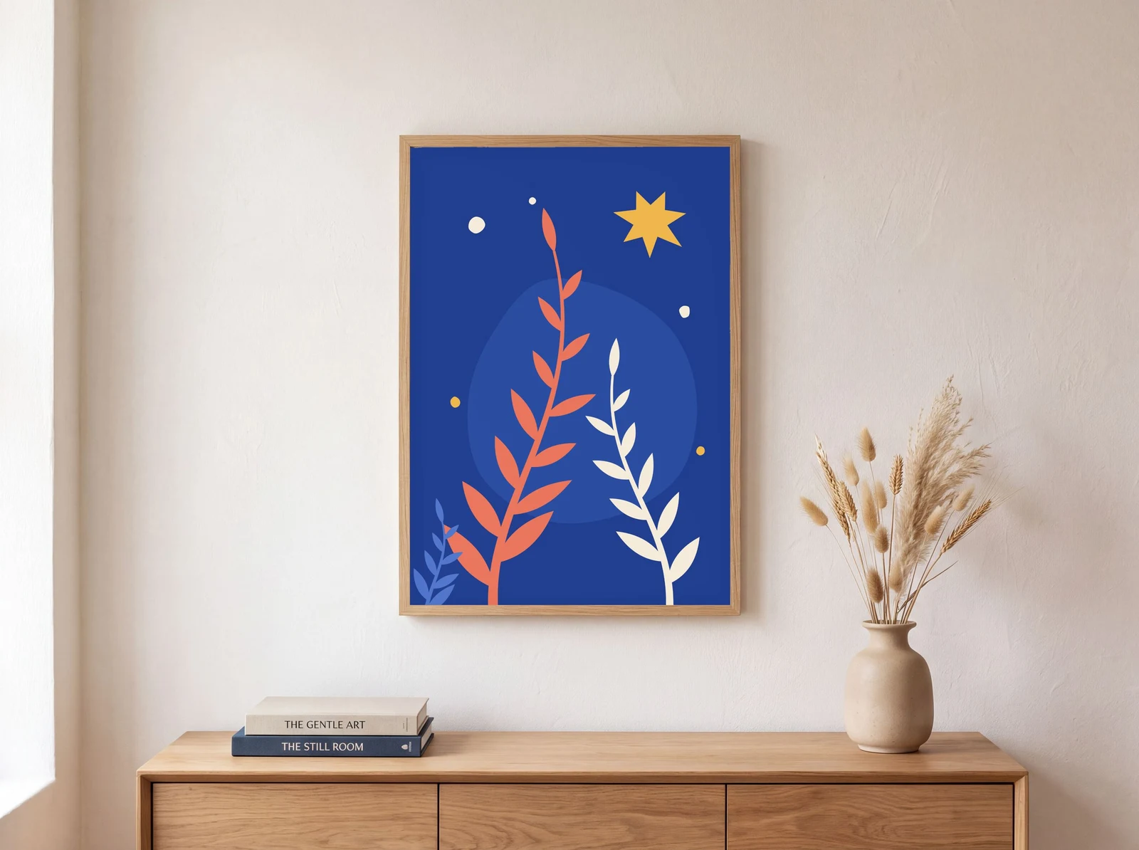 Framed botanical art print in a thin oak frame on a warm plaster wall above an oak sideboard, rendered by SudoMock at 2679 by 2000 pixels as a JPG