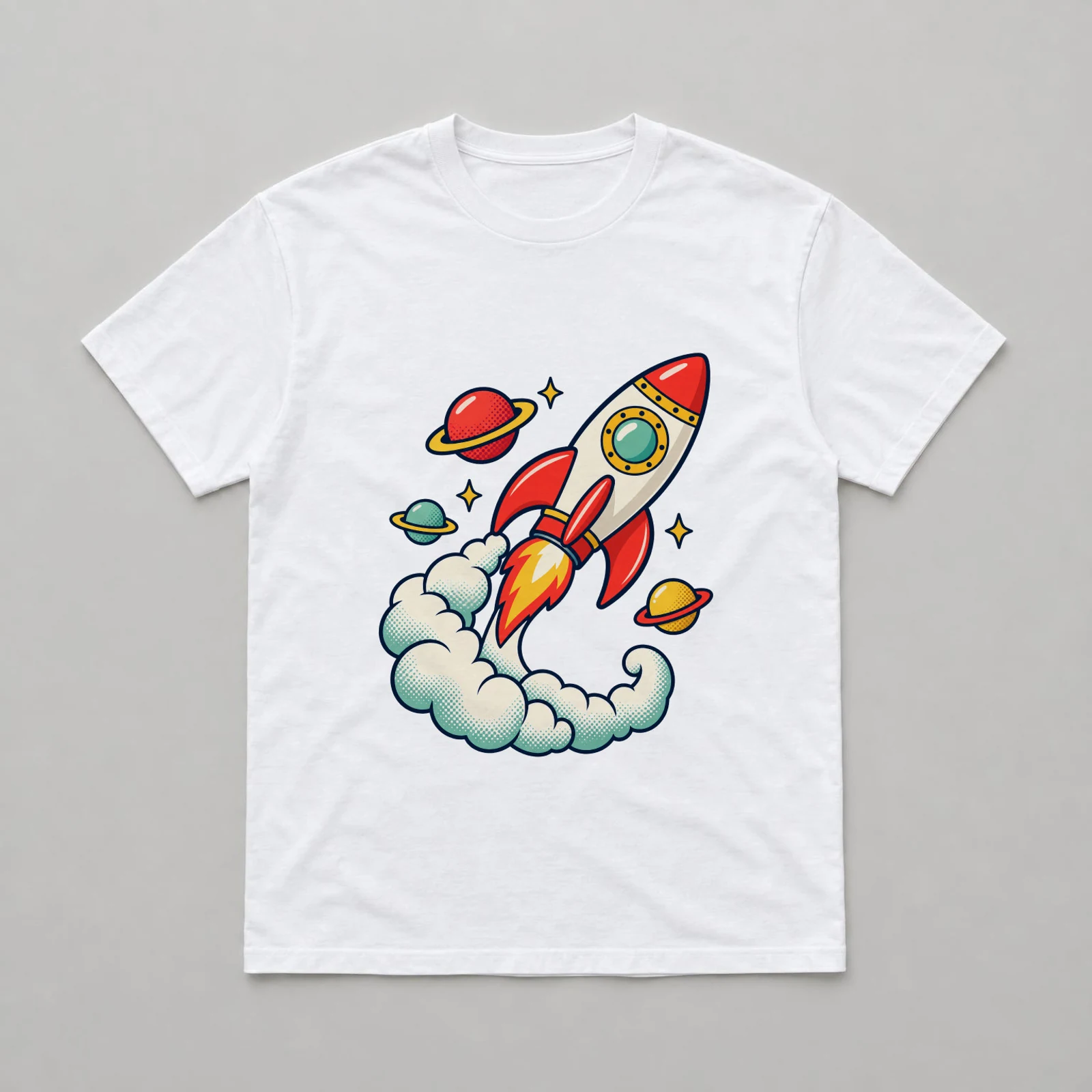 White t-shirt flat lay rendered by SudoMock with a retro red rocket, three ringed planets and a curling cloud trail centered on the chest